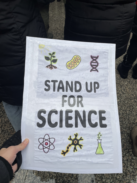 Photo of handmade sign saying stand up for science